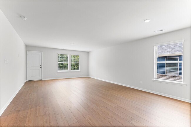 Building Photo - New 3BR Home in Whispering Woods – Modern ...