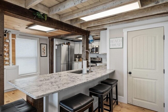 Building Photo - *Price Drop!* Your Dream Winter Retreat Aw...