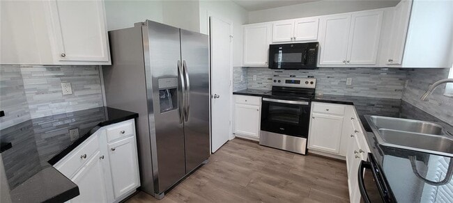 Building Photo - 9543 Maxson Dr