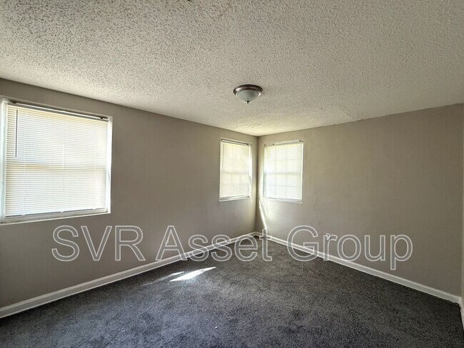 Building Photo - 9073 11th Ave