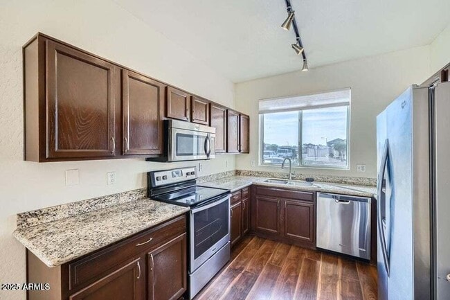 Building Photo - 15436 W Port Royale Ln