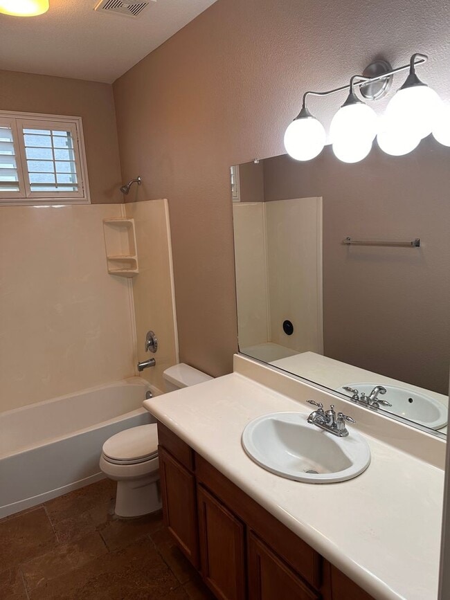 Building Photo - You have to see this yard and patio in the Vineyard subdivision in Northwest Hanford