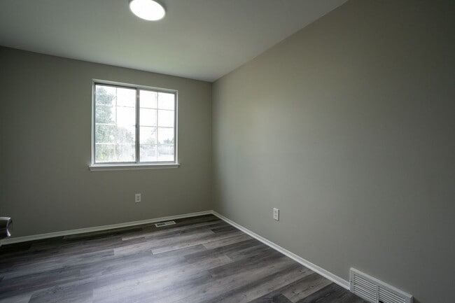 Building Photo - Must see FOUR bedroom Trilevel home