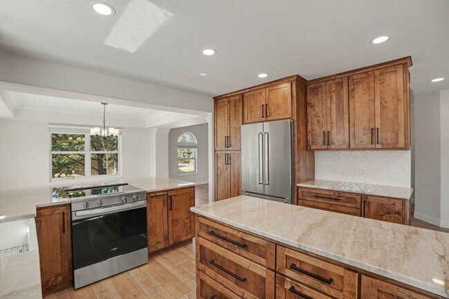 Building Photo - Backs to Open Space | Over 4,000 Sq Ft | Updated Kitchen + Solar