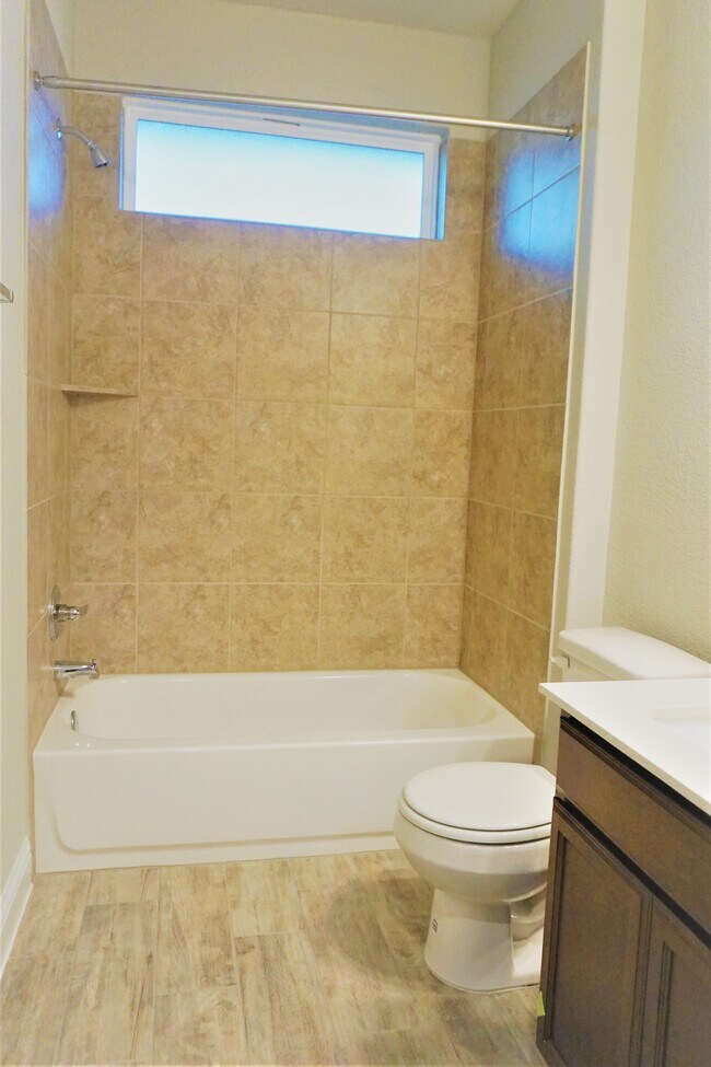 3rd full bathroom conveniently located downstairs. Great for after pool days/after work outs..etc.. - 260 Gaida Loop