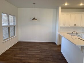 Building Photo - Beautiful brand new!! All the bells and whistles .