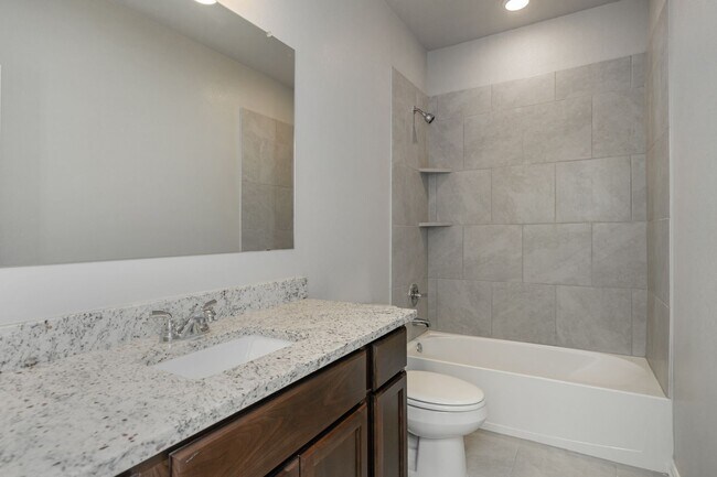 Building Photo - Spacious Townhome Available Now!