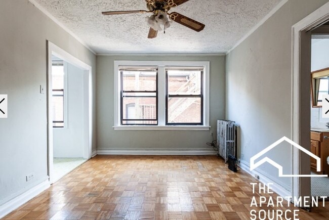Building Photo - 711 W Belmont Ave