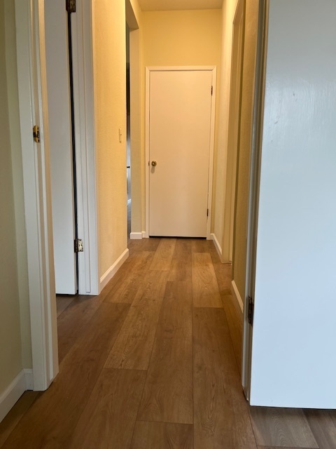 Hallway to Second and Third bedrooms and bath - 1419 West St