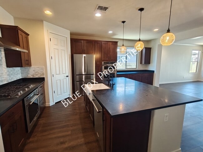 Building Photo - 8454 N Lone Ranger Rd