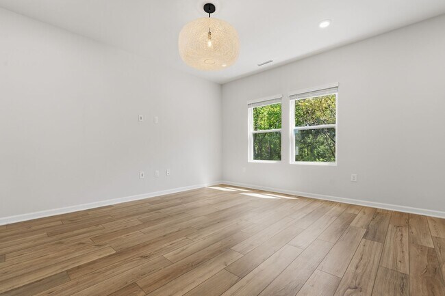 Building Photo - Move-In Ready 4BR Home | Deck, Patio & Open Concept Living