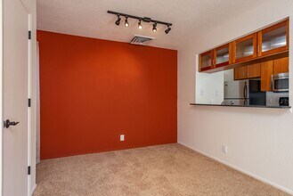 Building Photo - Light and Bright Second Level Condo Available Now!
