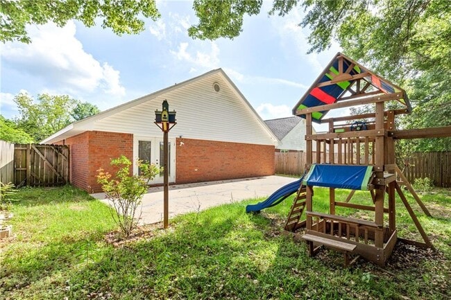 Building Photo - 8158 Magnolia Village Dr N