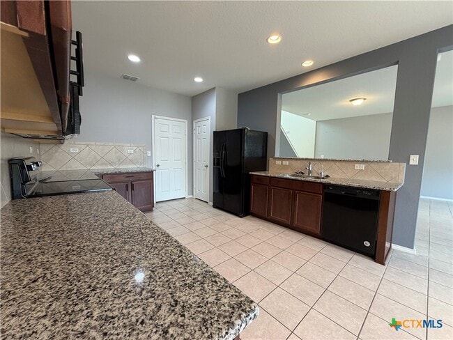 Building Photo - 323 Mistflower