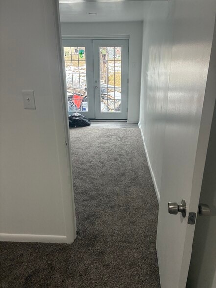 View from living to bedroom and back entrance door - 14433 Twig Rd