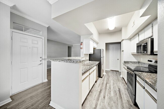 Building Photo - Modern, Pet-Friendly, and Priced Right!