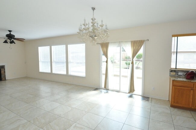 Building Photo - Spacious home for growing family with multiple dining and living areas! HUGE backyard!