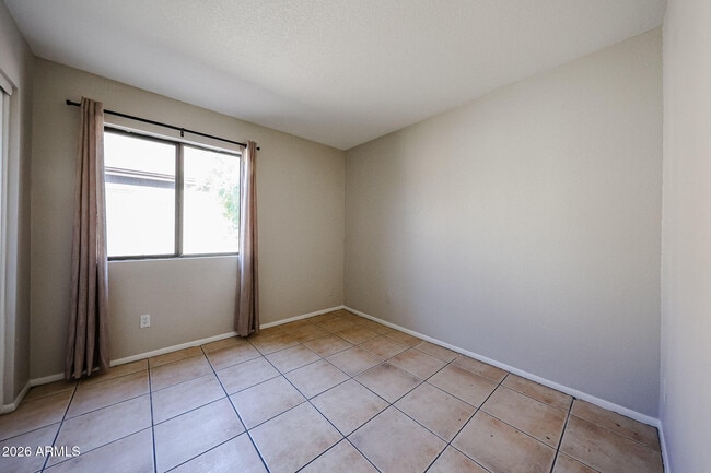 Building Photo - 8517 W College Dr