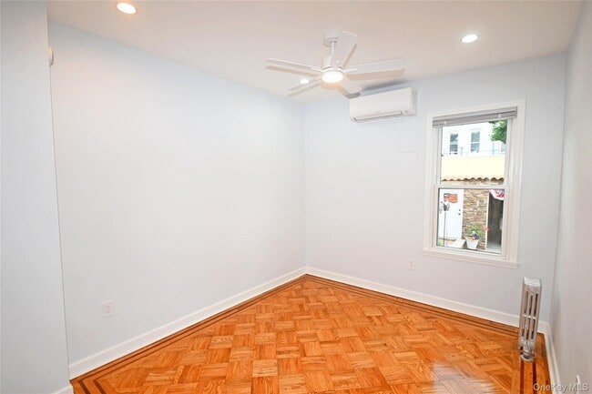 Building Photo - 70-30 66th Pl