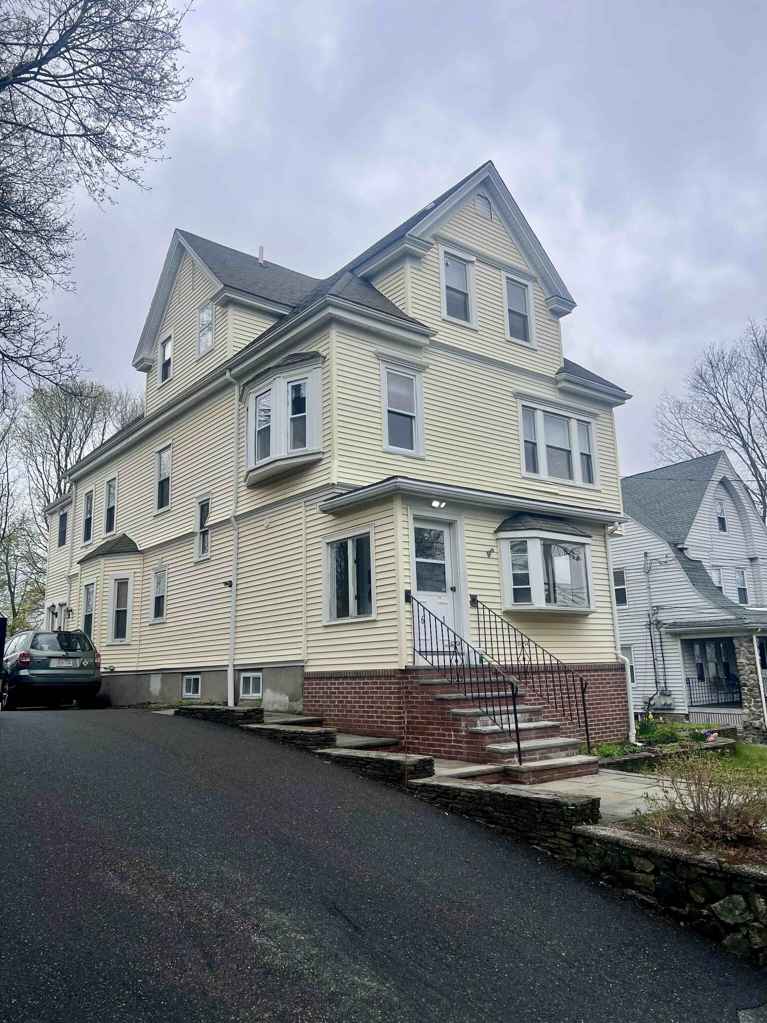 Side with driveway - 61 Wollaston Ave