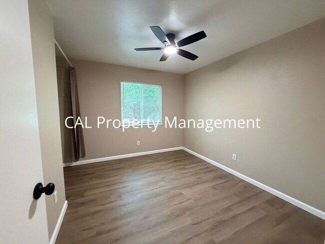 Building Photo - Spacious 4-Bedroom Home with 2-Car Garage & Backyard Oasis