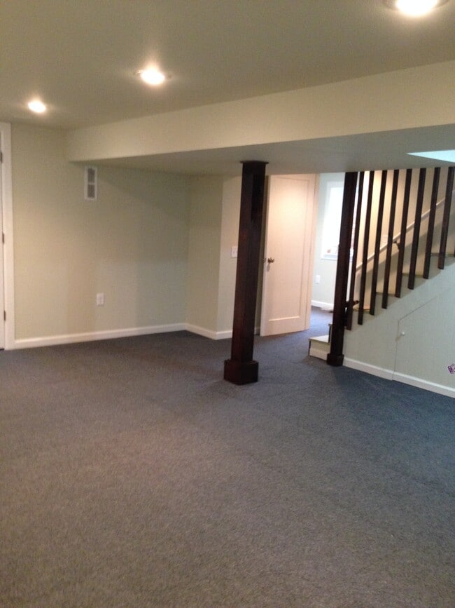 Finished basement with family room, bedroom #3, full bath, laundry/utility room and storage space - 2910 NE Mason