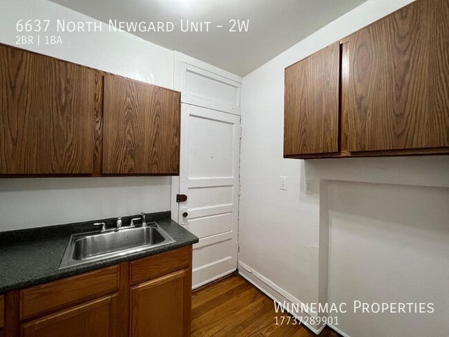 Building Photo - 6637 N Newgard Ave