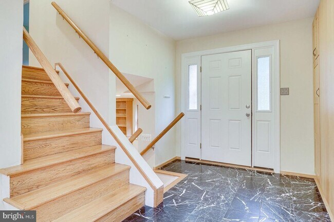 Building Photo - This elegant and unique three-level split ...