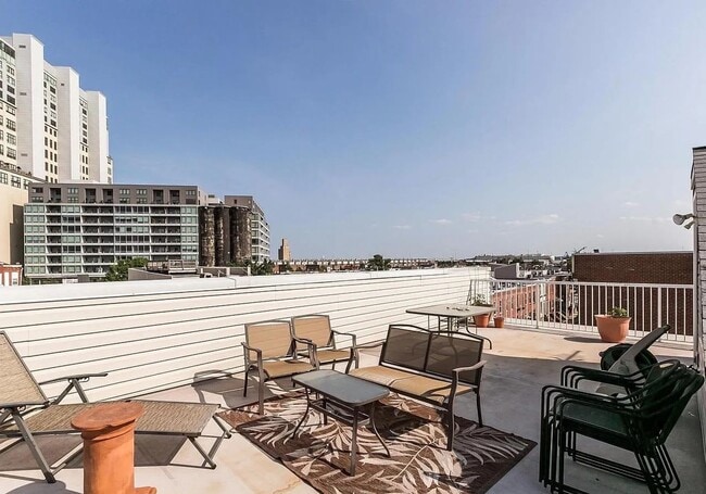Building Photo - Coming Soon – 3BR/4BA End-Unit Townhome wi...