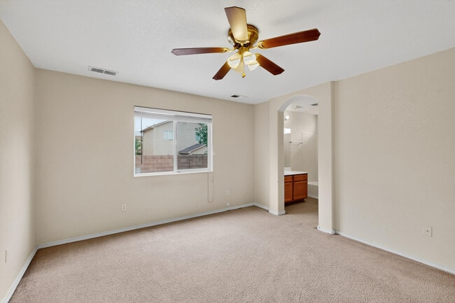 Building Photo - 9000 Violet Orchid Tr SW