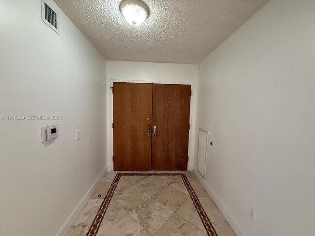 Building Photo - 16711 Collins Ave