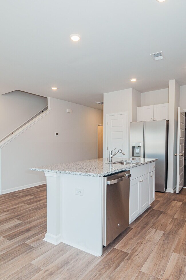 Building Photo - Brand-new 3 bedroom, 2.5 Bath Townhome with pond view