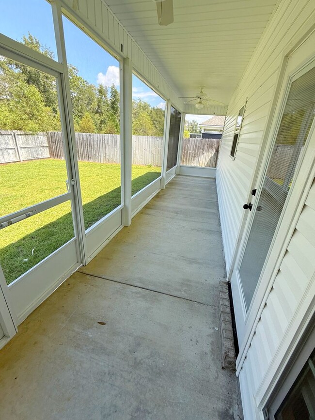Building Photo - Stylish 4-Bedroom Home with Screened Porch...