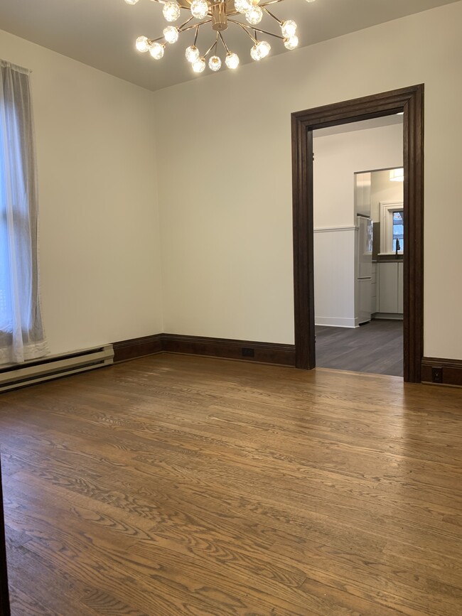 Dining Room looking back toward kitchen. - 1023 SE Bidwell St