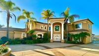 Building Photo - Stunning Custom Home in the Gated & Privat...