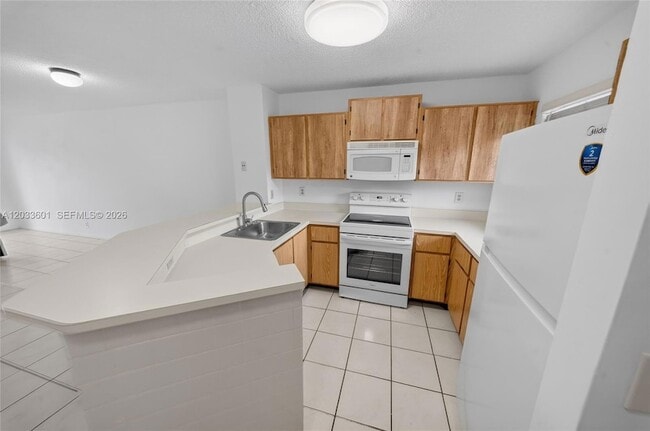 Building Photo - 8750 N Sherman Cir