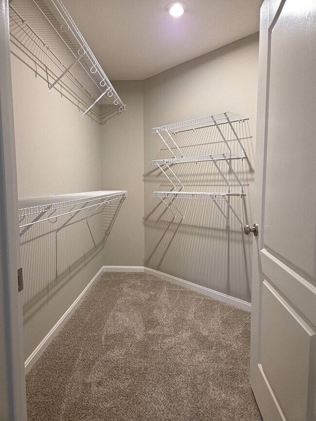 Building Photo - Exquisite just built condo with everything! Ground floor, no stairs, attached garage