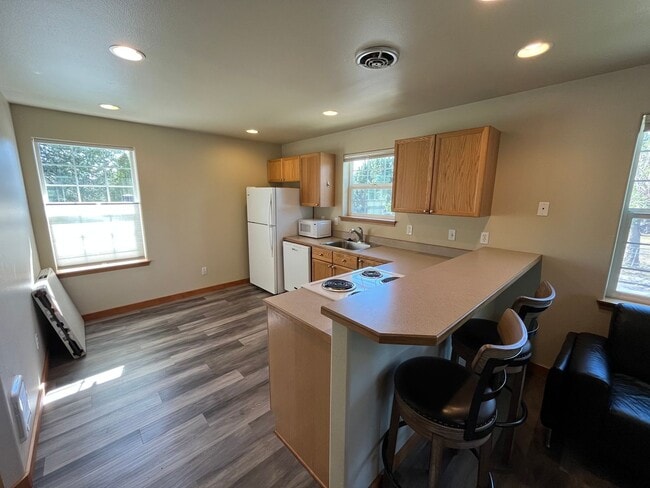 Building Photo - Nicely Update Home in Great Location with Hot Tub Care Included