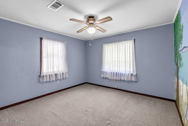 Building Photo - Timeless Charm in Ocean Springs’ Most Walk...