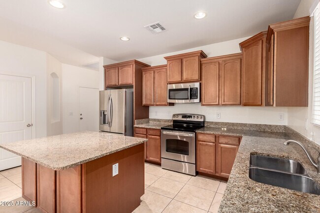 Building Photo - 9883 W Harmony Ln