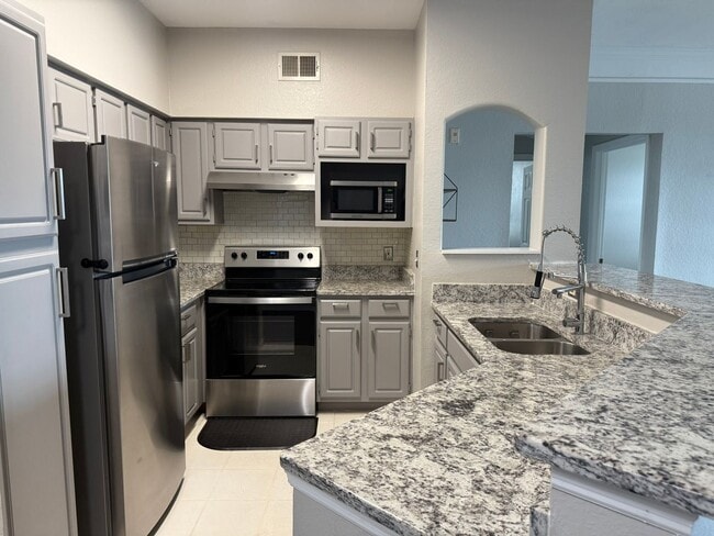 Building Photo - $1975 | 3-Bedroom 2-Bath Condo | Fully Ren...