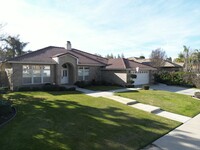 Building Photo - Spacious 4-Bedroom Home with Pool in Seven...