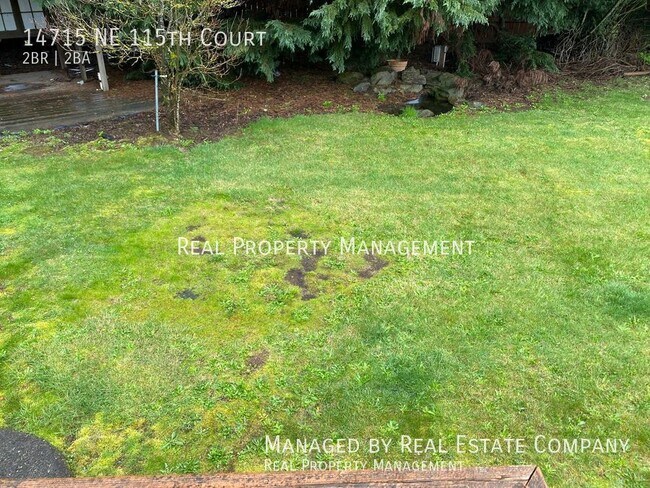 Building Photo - Ranch Style Brush Prairie Home with Large ...