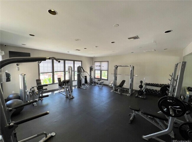 Building Photo - Bright 1 Bed Condo with Fitness Center & Prime Superior Location