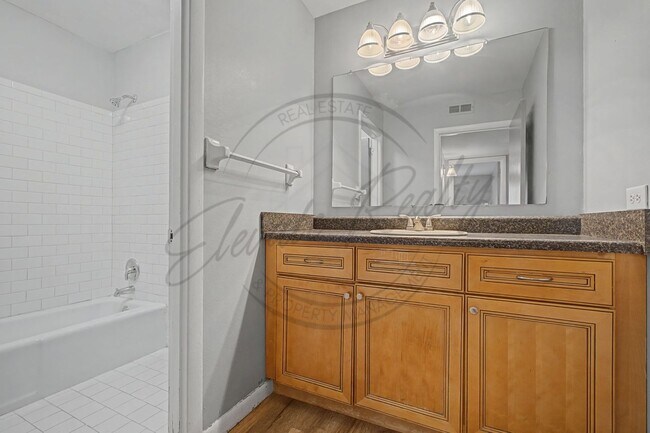 Building Photo - Two Bedroom Condo, First Floor, across from Madison Park with stackable washer/dryer!