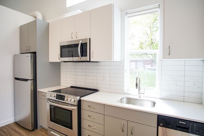 Building Photo - Spacious 1-Bedroom w/Condo-Grade Finishes