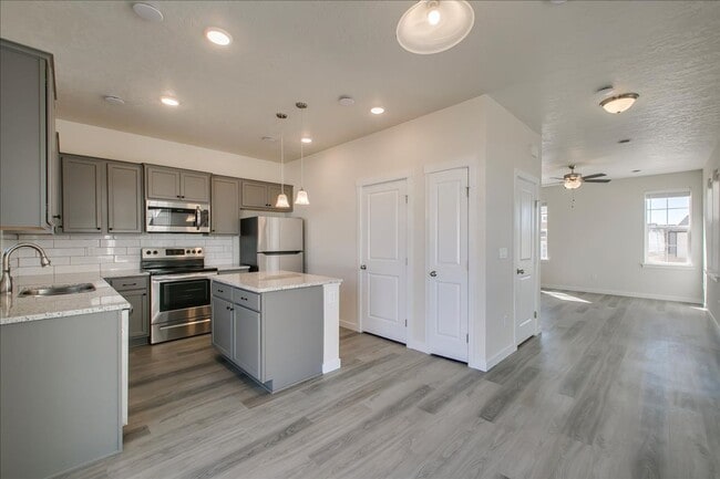 Building Photo - Two Story Townhome Located Off Of Amity & Five Mile!