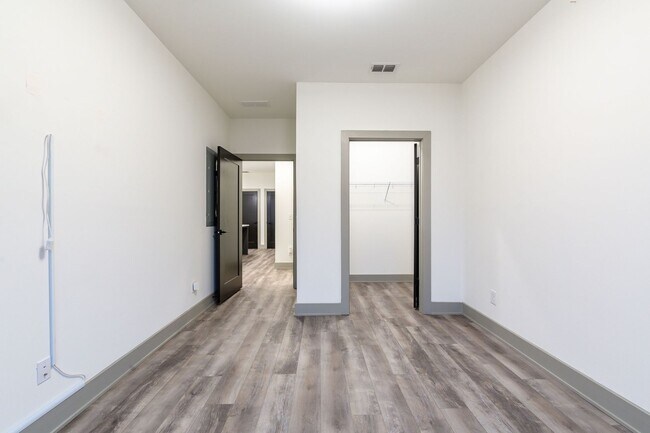 Building Photo - Modern Living Meets Walkable City Charm in...