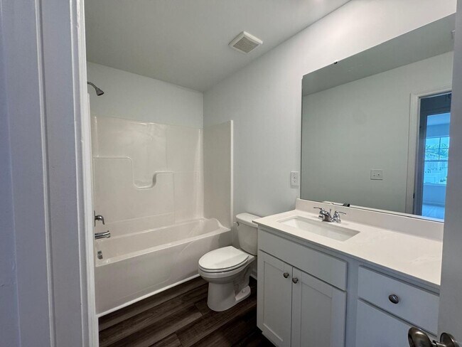 Building Photo - BRAND NEW GORGEOUS TOWNHOUSE in a very con...