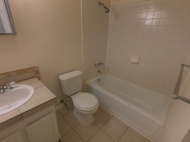 Building Photo - Tranquil Living in a Stylish 1 Bedroom Garden Floor Apartment
